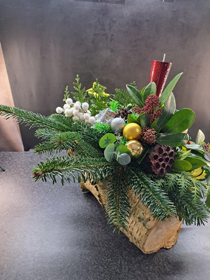 Kerststuk op Boomstam